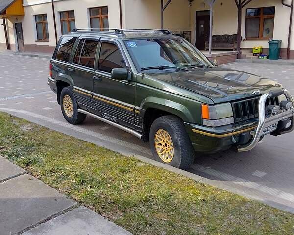 Зелений Джип Grand Cherokee, об'ємом двигуна 4 л та пробігом 382 тис. км за 4600 $, фото 4 на Automoto.ua