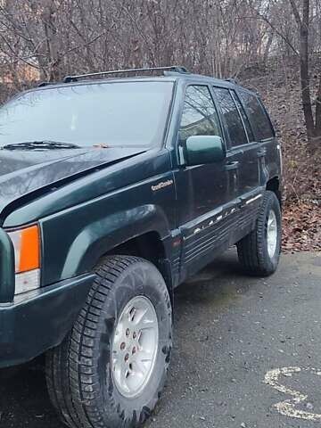 Зелений Джип Grand Cherokee, об'ємом двигуна 5.2 л та пробігом 421 тис. км за 3000 $, фото 3 на Automoto.ua
