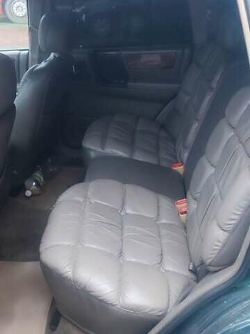 Зелений Джип Grand Cherokee, об'ємом двигуна 5.2 л та пробігом 421 тис. км за 3000 $, фото 4 на Automoto.ua