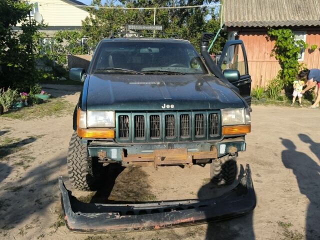 Зелений Джип Grand Cherokee, об'ємом двигуна 2.5 л та пробігом 300 тис. км за 1999 $, фото 2 на Automoto.ua