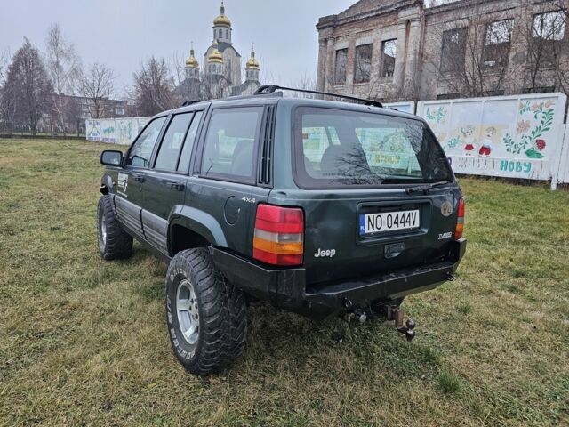 Зеленый Джип Гранд Чероки, объемом двигателя 2.5 л и пробегом 360 тыс. км за 3300 $, фото 3 на Automoto.ua