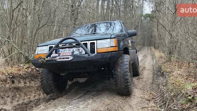 Зеленый Джип Гранд Чероки, объемом двигателя 2.5 л и пробегом 352 тыс. км за 4500 $, фото 3 на Automoto.ua