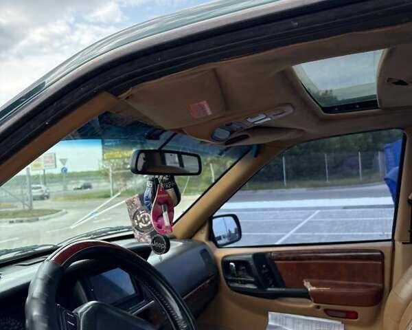 Зеленый Джип Гранд Чероки, объемом двигателя 3.96 л и пробегом 200 тыс. км за 4500 $, фото 8 на Automoto.ua