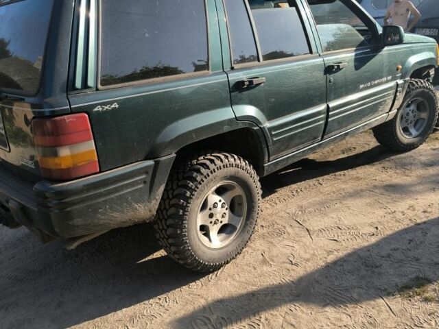 Зелений Джип Grand Cherokee, об'ємом двигуна 2.5 л та пробігом 300 тис. км за 1999 $, фото 3 на Automoto.ua