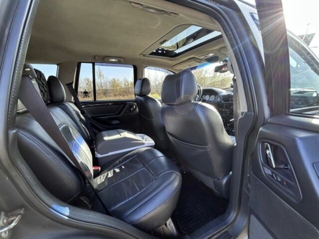 Зеленый Джип Гранд Чероки, объемом двигателя 2.7 л и пробегом 290 тыс. км за 4300 $, фото 15 на Automoto.ua