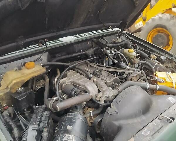 Зелений Джип Grand Cherokee, об'ємом двигуна 2.5 л та пробігом 999 тис. км за 2000 $, фото 9 на Automoto.ua