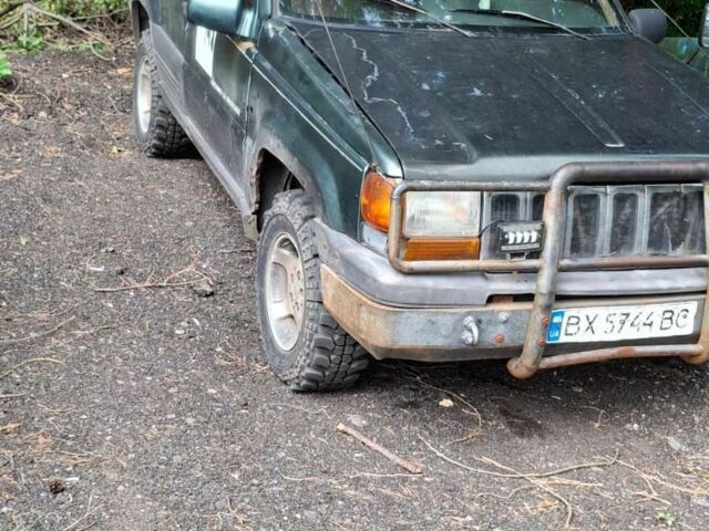 Зеленый Джип Гранд Чероки, объемом двигателя 2.5 л и пробегом 370 тыс. км за 3000 $, фото 4 на Automoto.ua