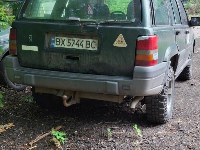 Зеленый Джип Гранд Чероки, объемом двигателя 2.5 л и пробегом 370 тыс. км за 3000 $, фото 1 на Automoto.ua