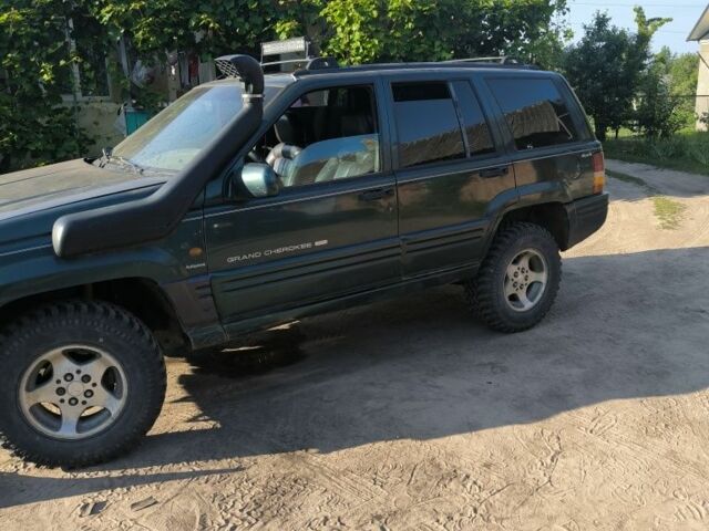 Зелений Джип Grand Cherokee, об'ємом двигуна 2.5 л та пробігом 300 тис. км за 1999 $, фото 1 на Automoto.ua