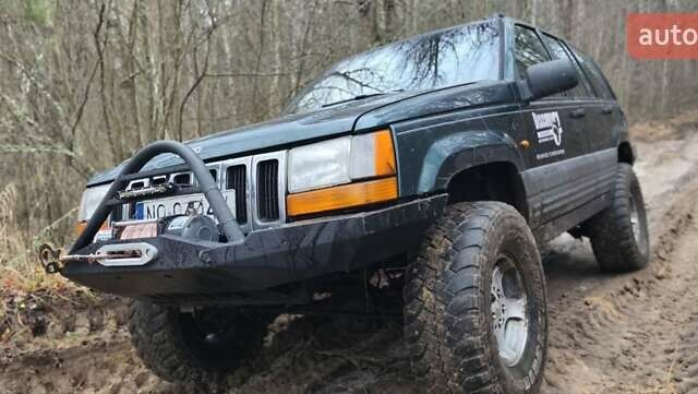 Зеленый Джип Гранд Чероки, объемом двигателя 2.5 л и пробегом 352 тыс. км за 4500 $, фото 1 на Automoto.ua