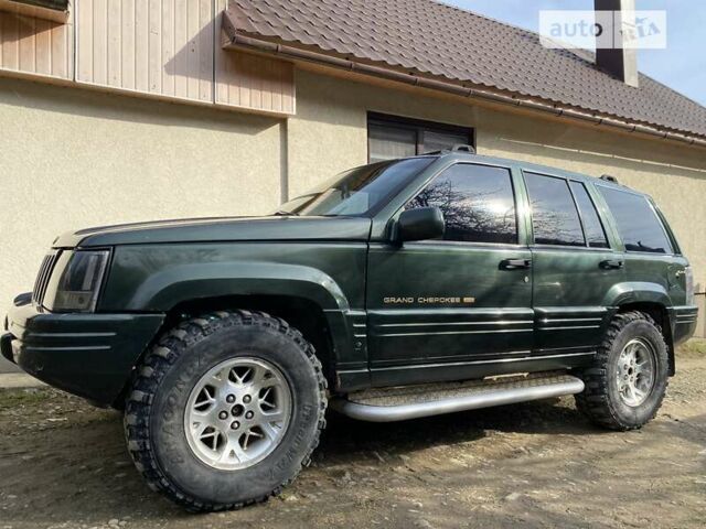 Зелений Джип Grand Cherokee, об'ємом двигуна 5.2 л та пробігом 320 тис. км за 5250 $, фото 7 на Automoto.ua