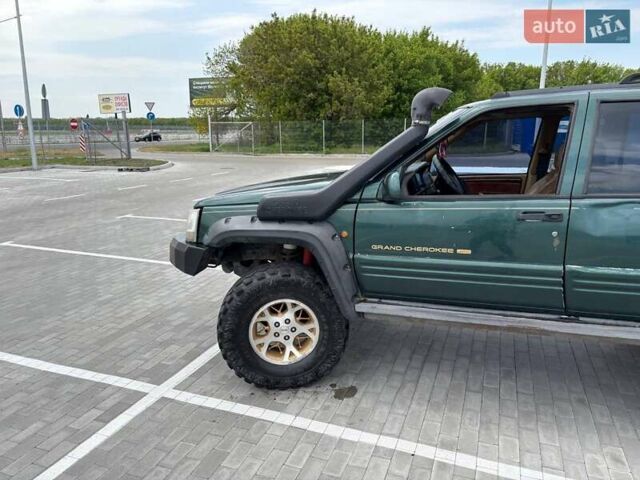 Зеленый Джип Гранд Чероки, объемом двигателя 3.96 л и пробегом 200 тыс. км за 4500 $, фото 4 на Automoto.ua