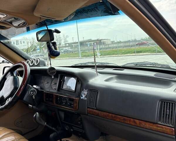 Зеленый Джип Гранд Чероки, объемом двигателя 3.96 л и пробегом 200 тыс. км за 4500 $, фото 10 на Automoto.ua