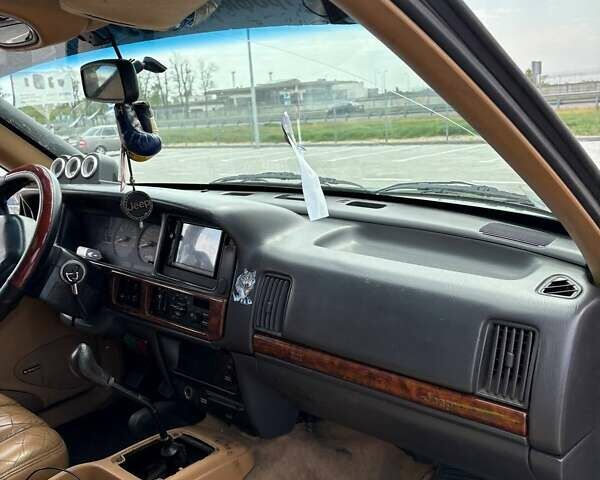 Зеленый Джип Гранд Чероки, объемом двигателя 3.96 л и пробегом 200 тыс. км за 4500 $, фото 9 на Automoto.ua