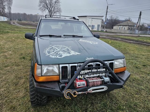 Зеленый Джип Гранд Чероки, объемом двигателя 2.5 л и пробегом 360 тыс. км за 3300 $, фото 2 на Automoto.ua