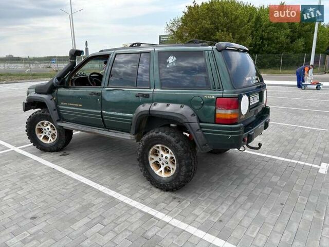 Зеленый Джип Гранд Чероки, объемом двигателя 3.96 л и пробегом 200 тыс. км за 4500 $, фото 2 на Automoto.ua