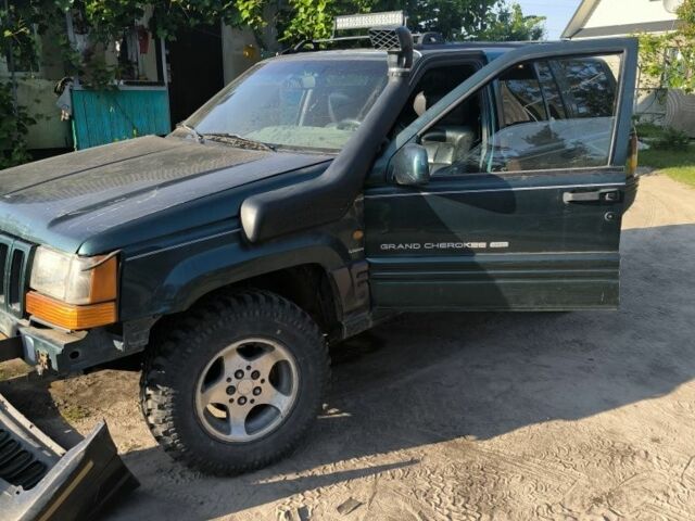 Зелений Джип Grand Cherokee, об'ємом двигуна 2.5 л та пробігом 300 тис. км за 1999 $, фото 6 на Automoto.ua