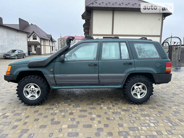 Зелений Джип Grand Cherokee, об'ємом двигуна 2.5 л та пробігом 307 тис. км за 9700 $, фото 9 на Automoto.ua