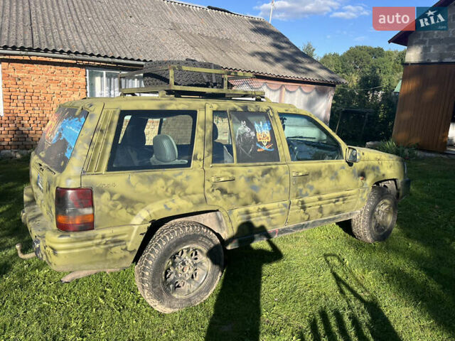 Зеленый Джип Гранд Чероки, объемом двигателя 2.5 л и пробегом 260 тыс. км за 5200 $, фото 2 на Automoto.ua