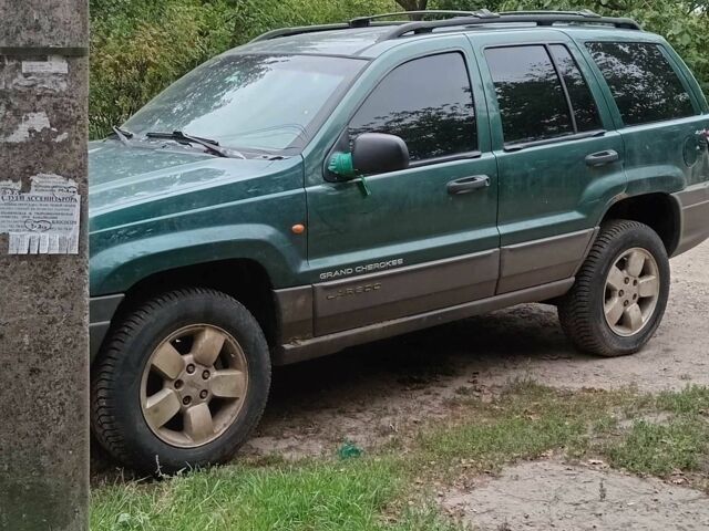 Зелений Джип Grand Cherokee, об'ємом двигуна 4 л та пробігом 200 тис. км за 2800 $, фото 1 на Automoto.ua