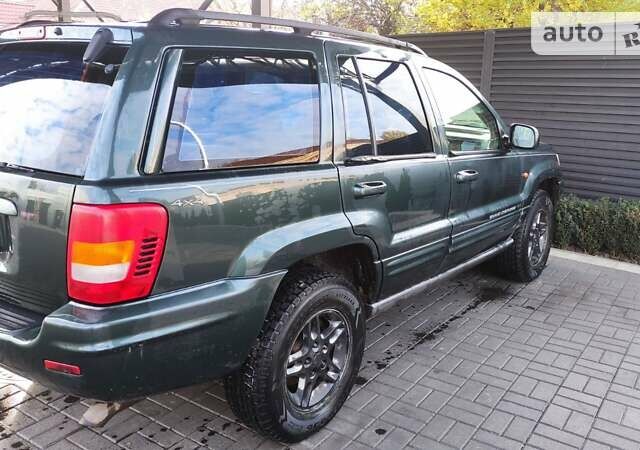 Зелений Джип Grand Cherokee, об'ємом двигуна 3.12 л та пробігом 286 тис. км за 7300 $, фото 27 на Automoto.ua