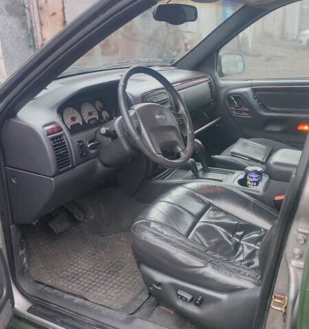 Зеленый Джип Гранд Чероки, объемом двигателя 3.12 л и пробегом 232 тыс. км за 3600 $, фото 6 на Automoto.ua