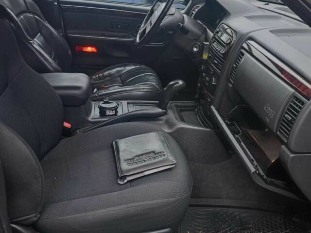 Зелений Джип Grand Cherokee, об'ємом двигуна 3.1 л та пробігом 323 тис. км за 3600 $, фото 8 на Automoto.ua