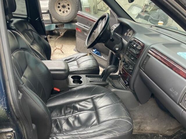 Зеленый Джип Гранд Чероки, объемом двигателя 3.1 л и пробегом 250 тыс. км за 2248 $, фото 2 на Automoto.ua