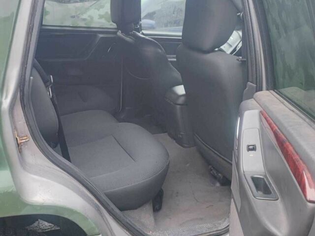 Зелений Джип Grand Cherokee, об'ємом двигуна 3.1 л та пробігом 323 тис. км за 3600 $, фото 9 на Automoto.ua