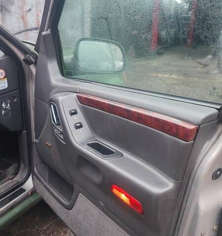 Зеленый Джип Гранд Чероки, объемом двигателя 3.12 л и пробегом 232 тыс. км за 3600 $, фото 10 на Automoto.ua