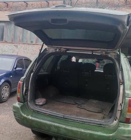 Зеленый Джип Гранд Чероки, объемом двигателя 3.12 л и пробегом 232 тыс. км за 3600 $, фото 4 на Automoto.ua