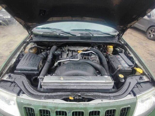 Зелений Джип Grand Cherokee, об'ємом двигуна 3.1 л та пробігом 323 тис. км за 3600 $, фото 4 на Automoto.ua