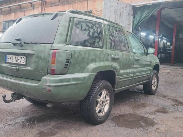 Зелений Джип Grand Cherokee, об'ємом двигуна 3.1 л та пробігом 323 тис. км за 3600 $, фото 2 на Automoto.ua
