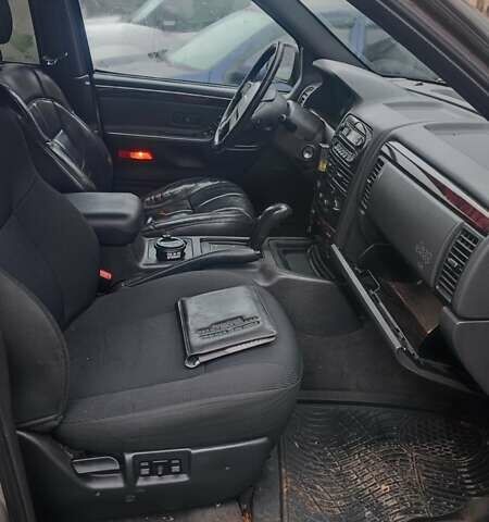 Зеленый Джип Гранд Чероки, объемом двигателя 3.12 л и пробегом 232 тыс. км за 3600 $, фото 8 на Automoto.ua