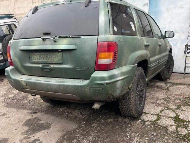 Зеленый Джип Гранд Чероки, объемом двигателя 3.1 л и пробегом 250 тыс. км за 2248 $, фото 3 на Automoto.ua