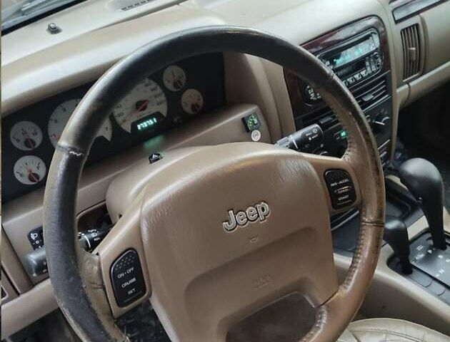 Зелений Джип Grand Cherokee, об'ємом двигуна 2.7 л та пробігом 279 тис. км за 2832 $, фото 7 на Automoto.ua