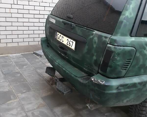 Зеленый Джип Гранд Чероки, объемом двигателя 3.12 л и пробегом 256 тыс. км за 4200 $, фото 5 на Automoto.ua