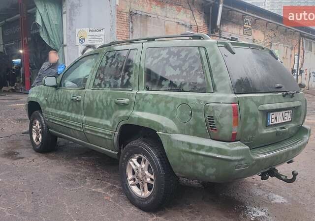 Зеленый Джип Гранд Чероки, объемом двигателя 3.12 л и пробегом 232 тыс. км за 3600 $, фото 3 на Automoto.ua