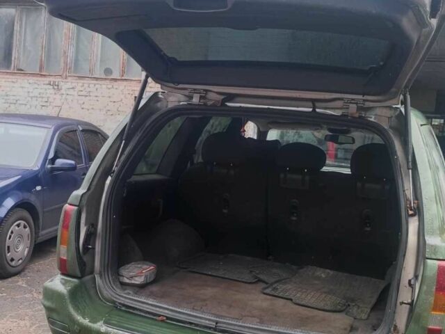 Зелений Джип Grand Cherokee, об'ємом двигуна 3.1 л та пробігом 323 тис. км за 3600 $, фото 5 на Automoto.ua