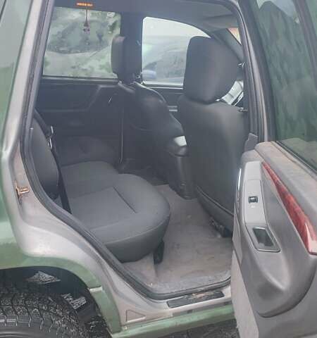 Зеленый Джип Гранд Чероки, объемом двигателя 3.12 л и пробегом 232 тыс. км за 3600 $, фото 9 на Automoto.ua