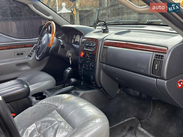 Зелений Джип Grand Cherokee, об'ємом двигуна 2.7 л та пробігом 376 тис. км за 9800 $, фото 14 на Automoto.ua