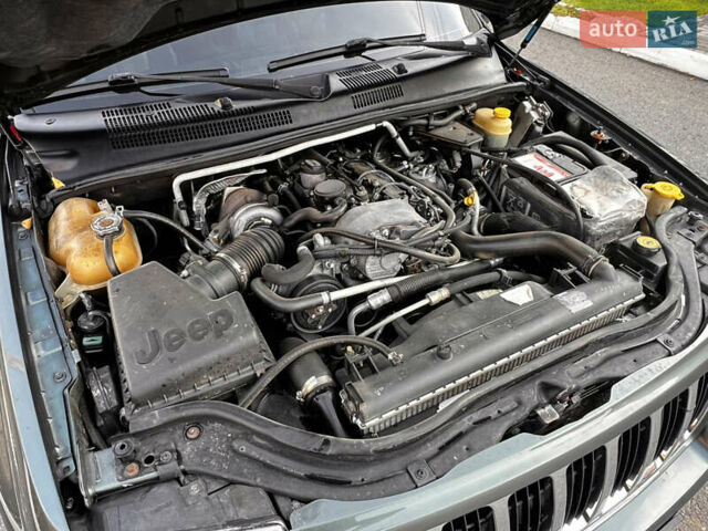 Зелений Джип Grand Cherokee, об'ємом двигуна 2.7 л та пробігом 376 тис. км за 9800 $, фото 28 на Automoto.ua
