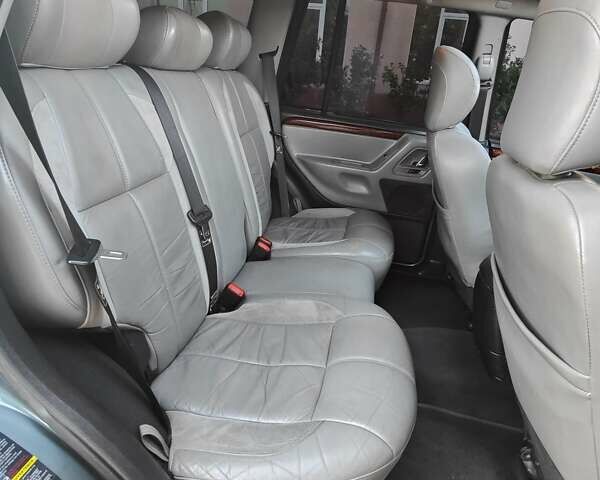 Зелений Джип Grand Cherokee, об'ємом двигуна 2.7 л та пробігом 374 тис. км за 9300 $, фото 22 на Automoto.ua