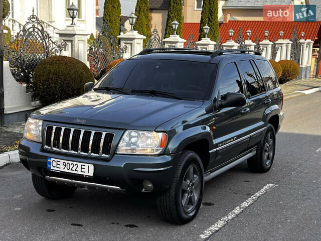 Зелений Джип Grand Cherokee, об'ємом двигуна 2.7 л та пробігом 376 тис. км за 9800 $, фото 3 на Automoto.ua