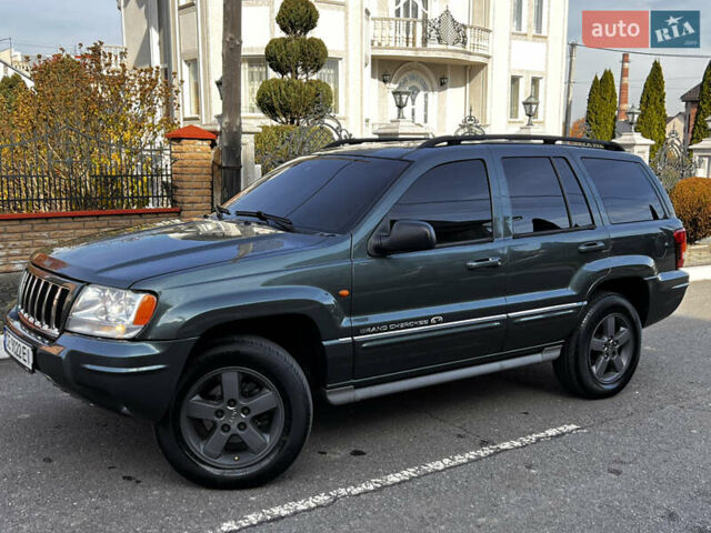 Зелений Джип Grand Cherokee, об'ємом двигуна 2.7 л та пробігом 376 тис. км за 9800 $, фото 6 на Automoto.ua