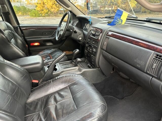 Зеленый Джип Гранд Чероки, объемом двигателя 2.7 л и пробегом 378 тыс. км за 5800 $, фото 3 на Automoto.ua