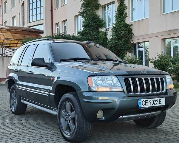 Зелений Джип Grand Cherokee, об'ємом двигуна 2.7 л та пробігом 374 тис. км за 9300 $, фото 4 на Automoto.ua