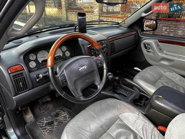 Зелений Джип Grand Cherokee, об'ємом двигуна 2.7 л та пробігом 376 тис. км за 9800 $, фото 15 на Automoto.ua