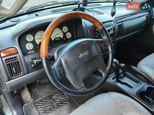 Зелений Джип Grand Cherokee, об'ємом двигуна 2.7 л та пробігом 374 тис. км за 9300 $, фото 13 на Automoto.ua