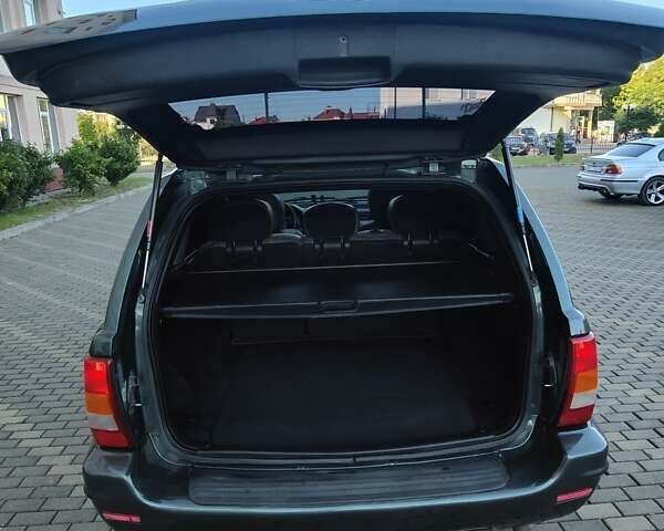 Зелений Джип Grand Cherokee, об'ємом двигуна 2.7 л та пробігом 374 тис. км за 9300 $, фото 27 на Automoto.ua